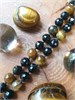 Семя намерения из тигрового глаза на бусах из обсидиана подбус198 - фото 17462