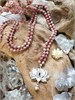 Лотос с жемчужиной на бусах из родонита подбус222